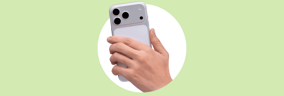 Hand holding a smartphone to upload a purchase receipt.