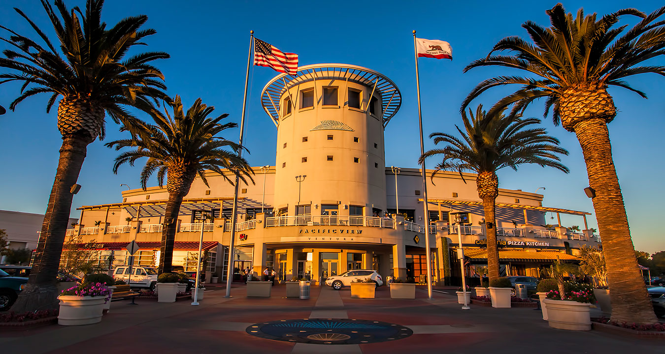 Pacific View's exterior at sunset