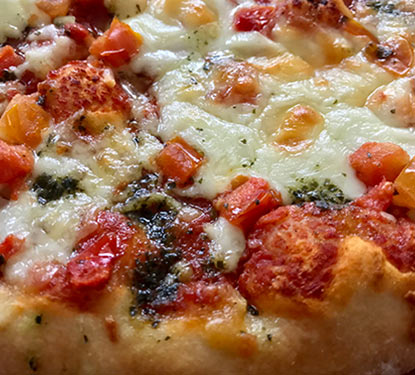 Close-up of a bubbling pizza