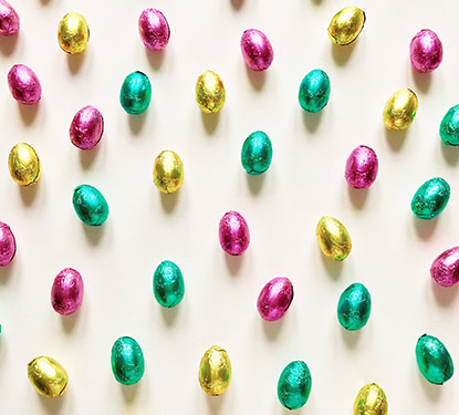 Easter egg candies wrapped in pastel foil