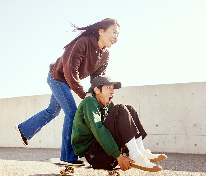 Teens on a skateboard