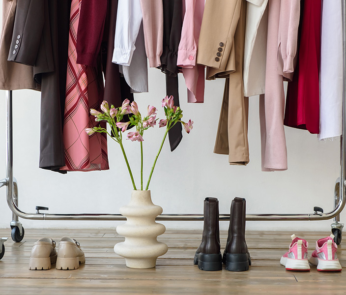 Clothing displayed on a rack at a women's clothing boutique