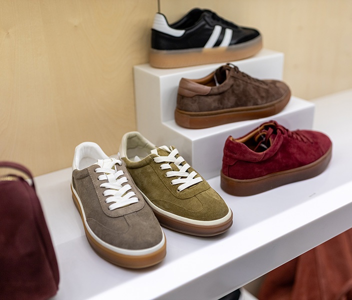 Suede sneakers on display