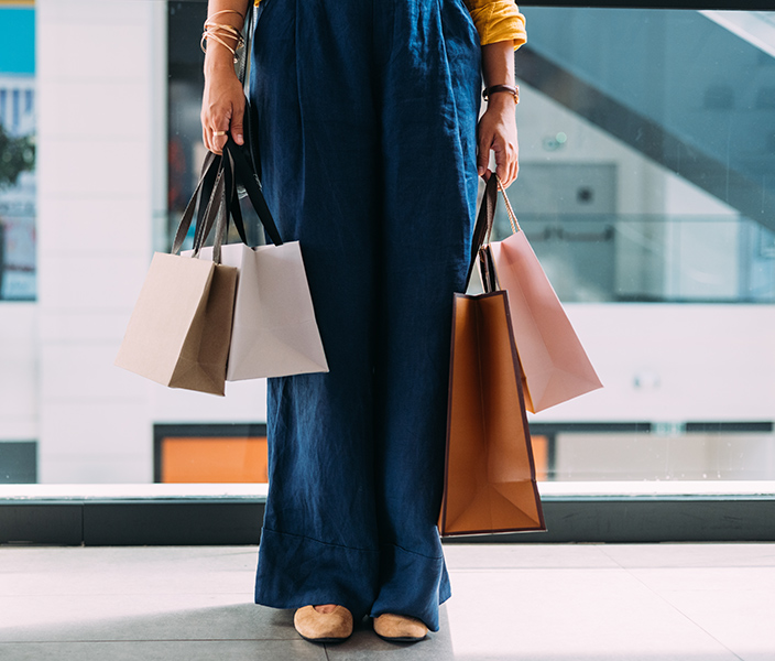 A woman holding shopping bags