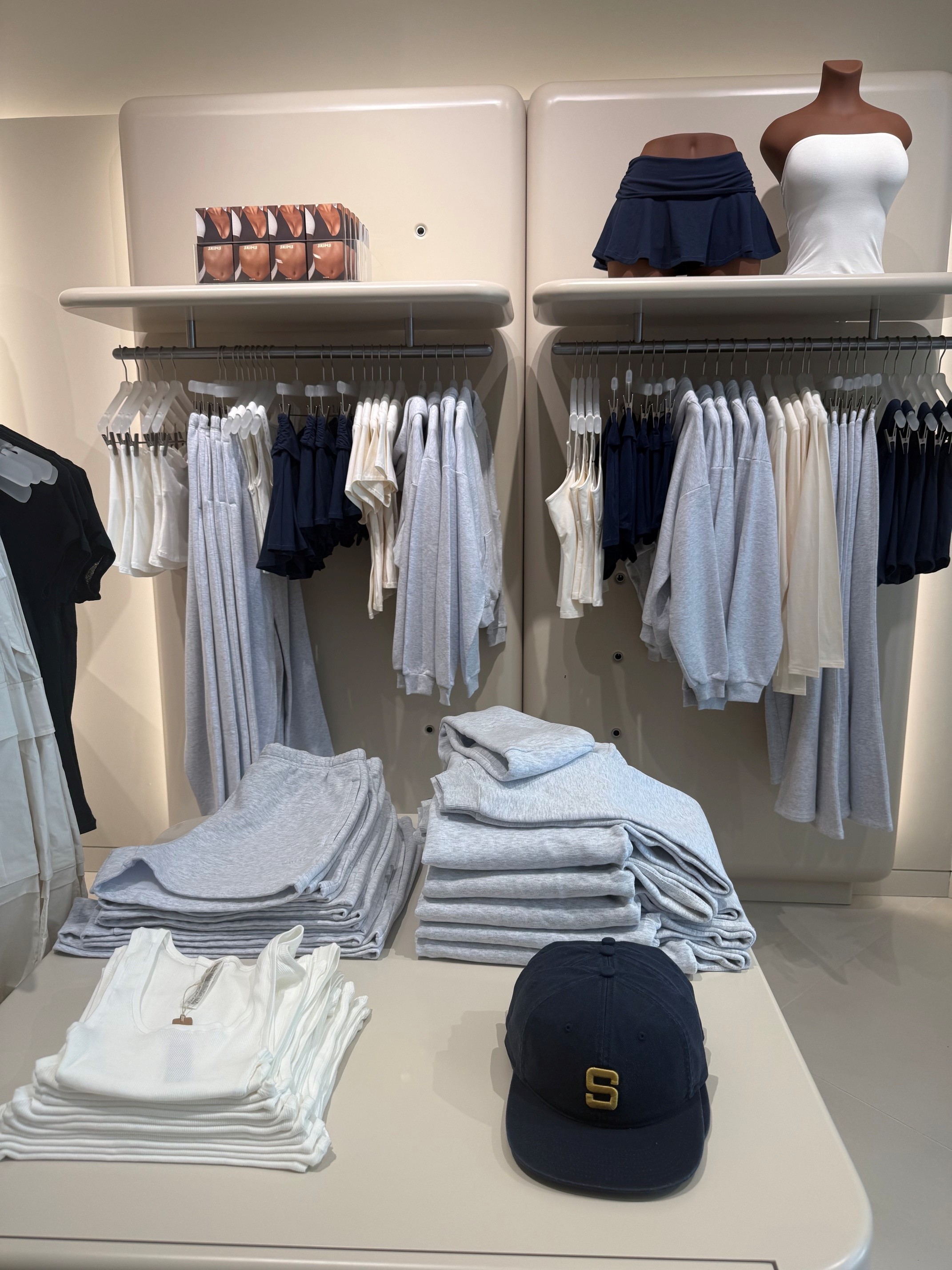 Athleisure pieces from SKIMS on display