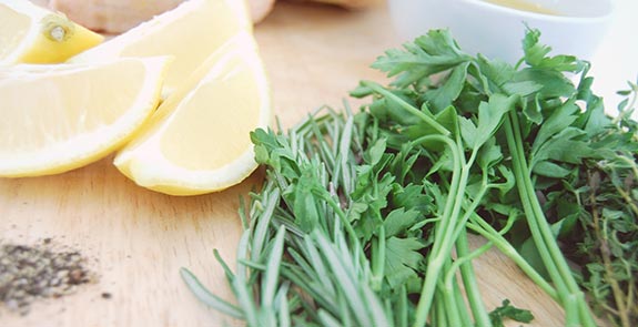 sliced lemon and herbs