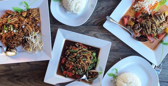 Dishes of Thai food on a table