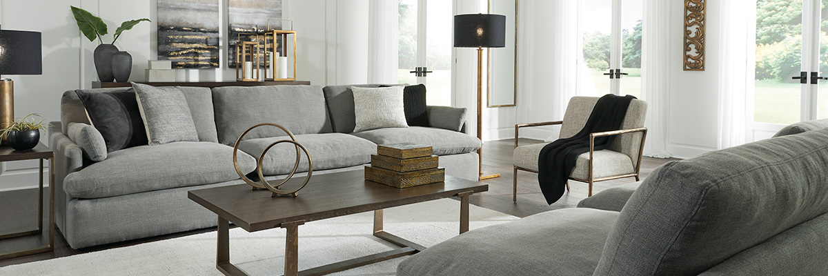 A living room furnished with contemporary-style Ashley furniture